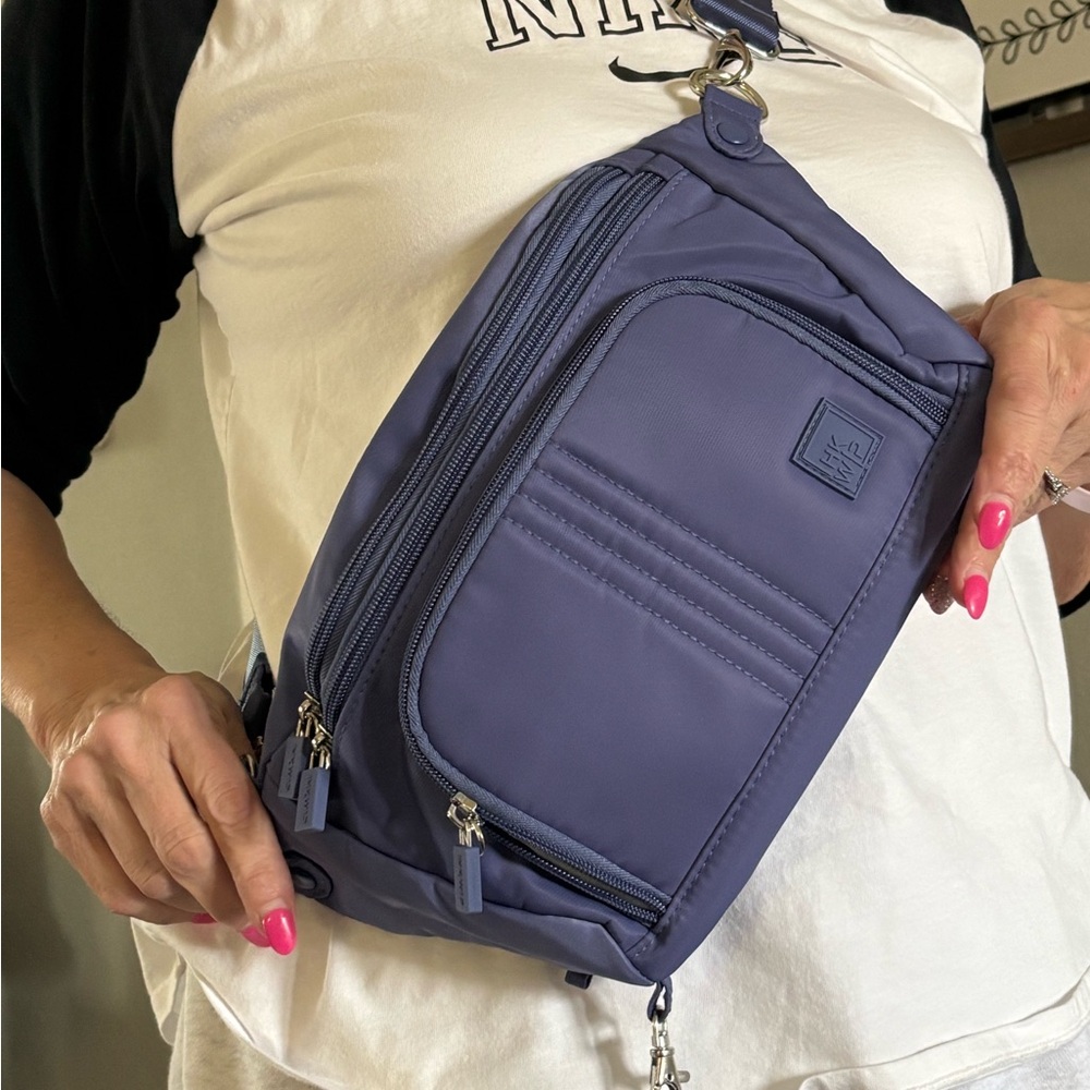 IHKWIP Crossbody bag. A beautiful, deep purple.multiple pockets, RID protection